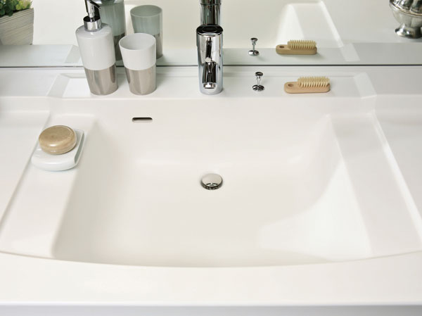 Bathing-wash room.  [Clean bowl] Your easy-care bowl-integrated counter was devising the shape of the bowl and the counter.
