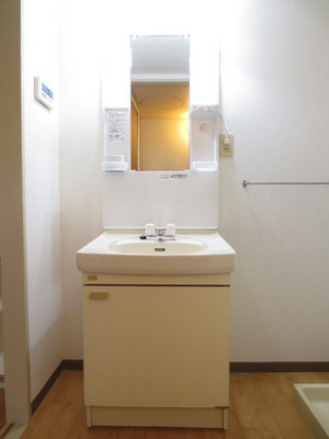 Washroom. Convenient independent vanity for storage of daily necessities, etc..