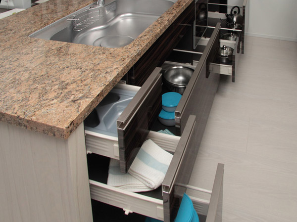 Kitchen.  [Slide storage] To reduce the occurrence of sound, Slide housing with a high safety bull motion.