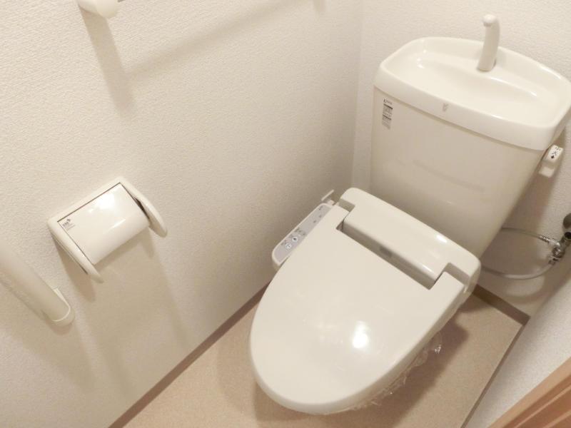 Toilet. Bidet equipped. Comfortable.