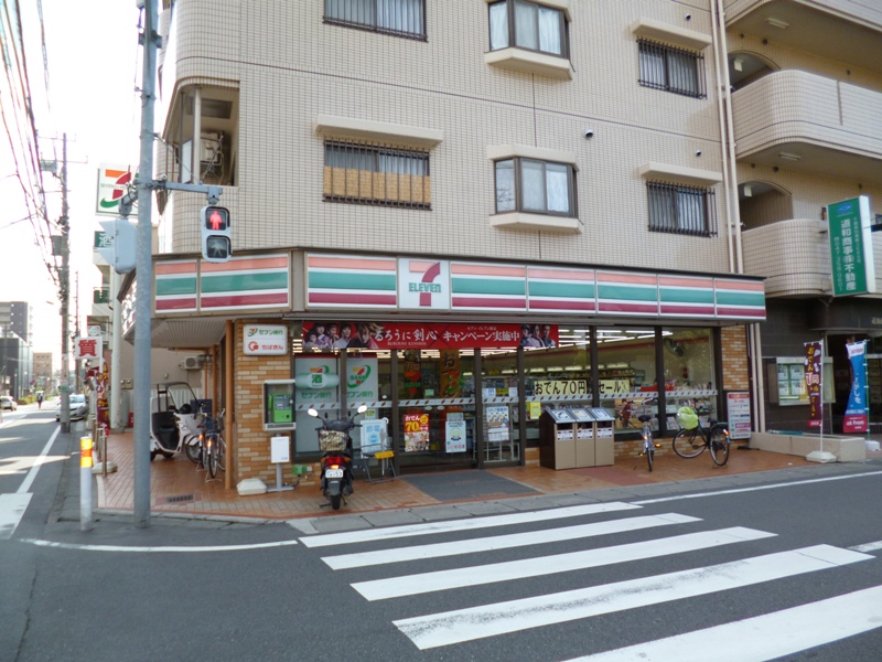 Convenience store. Seven-Eleven Ichikawaminami Gyotokuekimae store up (convenience store) 365m
