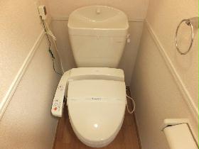Toilet. It is equipped with a warm water washing toilet seat