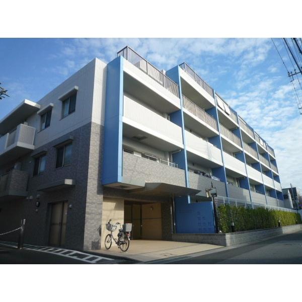 Local appearance photo. Exterior Photos: mansion nestled in a quiet residential area