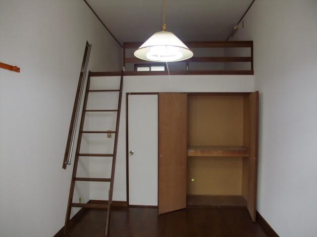 Living and room. It Is large loft is happy.