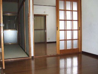 Living and room. Living is a space. Western-style is a sliding door.