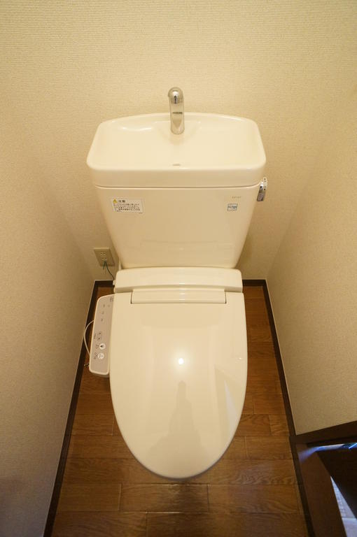 Toilet. Multi-function warm water washing toilet seat