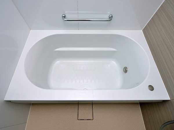 Bathing-wash room.  [WA bathtub] Adopt a round type of WA tub draw a graceful arch. Soft curve will enhance the relaxation.