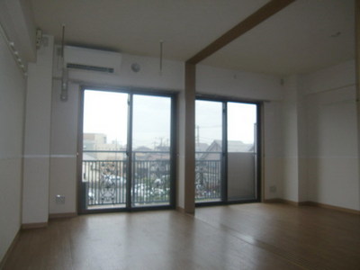 Living and room. It is quite wide and to open the sliding door.