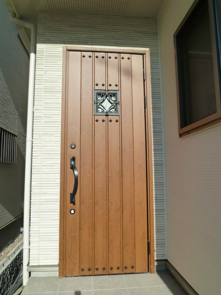 Other. Woody tone entrance door has been adopted in all building.