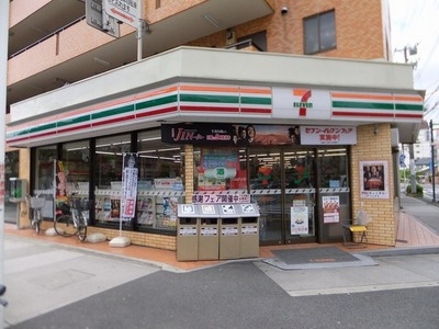 Convenience store. Seven-Eleven Gyotokuekimae store up (convenience store) 330m