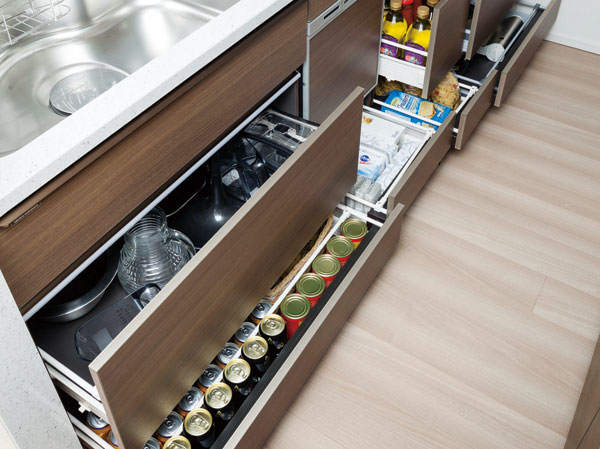 Kitchen.  [All slide storage] Under-counter storage is also taken out easily slide drawer thing in the back.