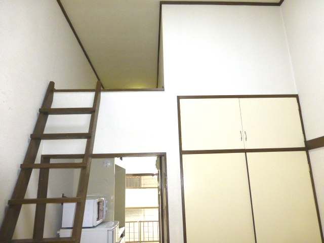 Living and room. There are ceiling high sense of openness