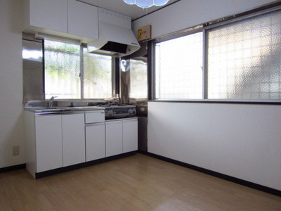 Living and room. It is very bright dining kitchen with a two-sided window.