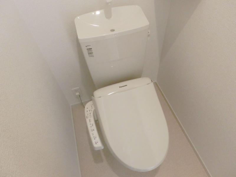 Toilet. Toilet is with a bidet.