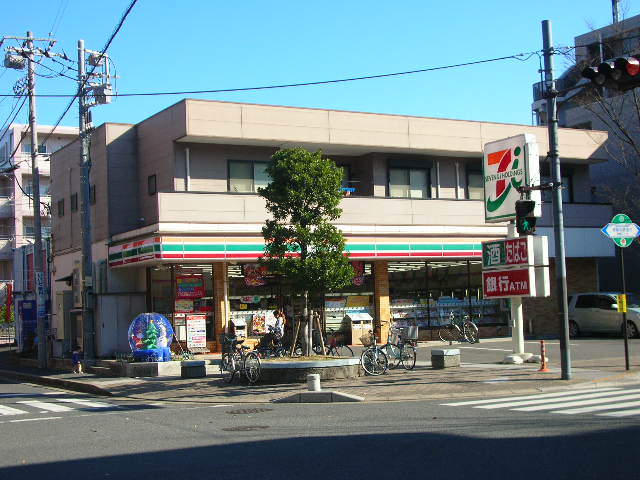 Convenience store. Seven-Eleven Ichikawa Myoden store up (convenience store) 450m