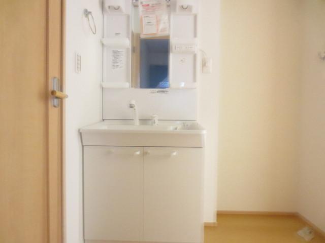 Wash basin, toilet. Washroom