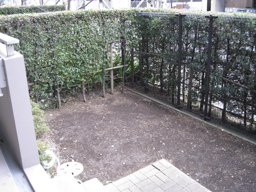 Other. Private garden is bright in the southwest-facing