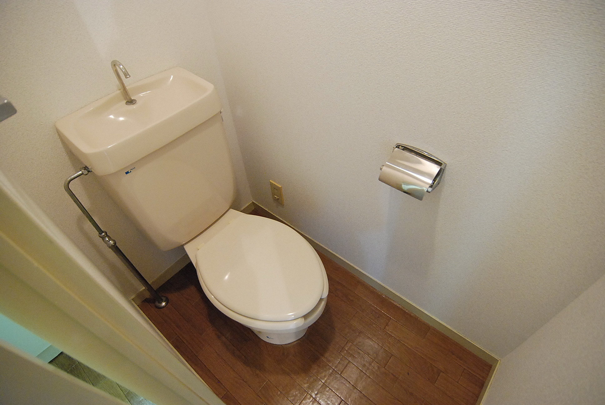 Toilet. Also given warm water washing toilet seat.