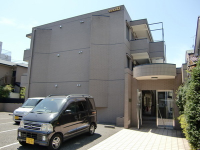 Building appearance. It is a beautiful apartment tiled.