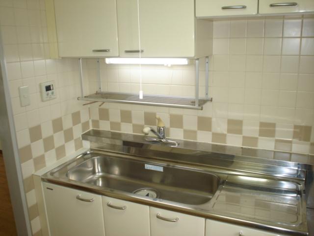 Kitchen. For there is a storage compartment also kitchen