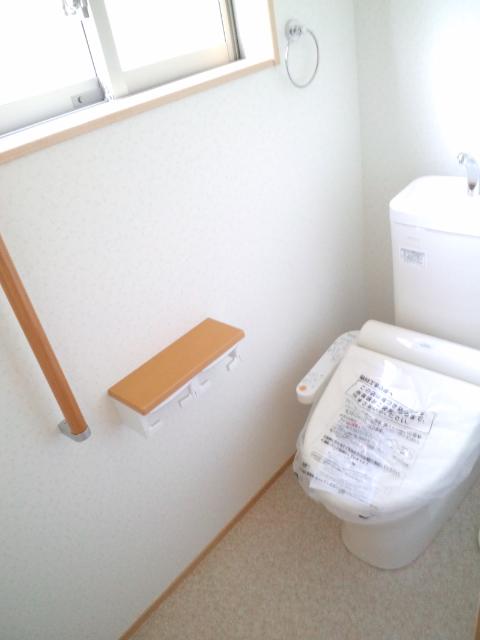 Toilet. Bright toilet with a window