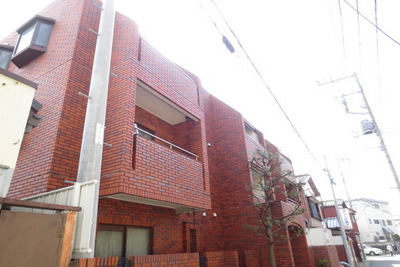 Building appearance. Stylish appearance of red brick