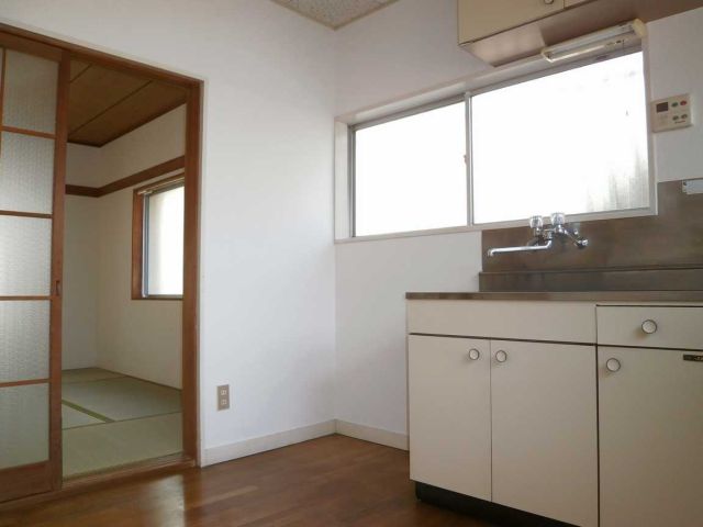 Kitchen. There is also a large window in the kitchen