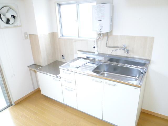 Kitchen. With window to the kitchen.