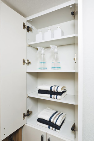 Bathing-wash room.  [Linen cabinet] Convenient storage of towels and laundry supplies. Organized space will be maintained.