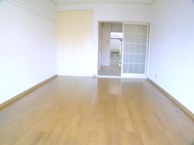 Living and room. It is decorated clean.