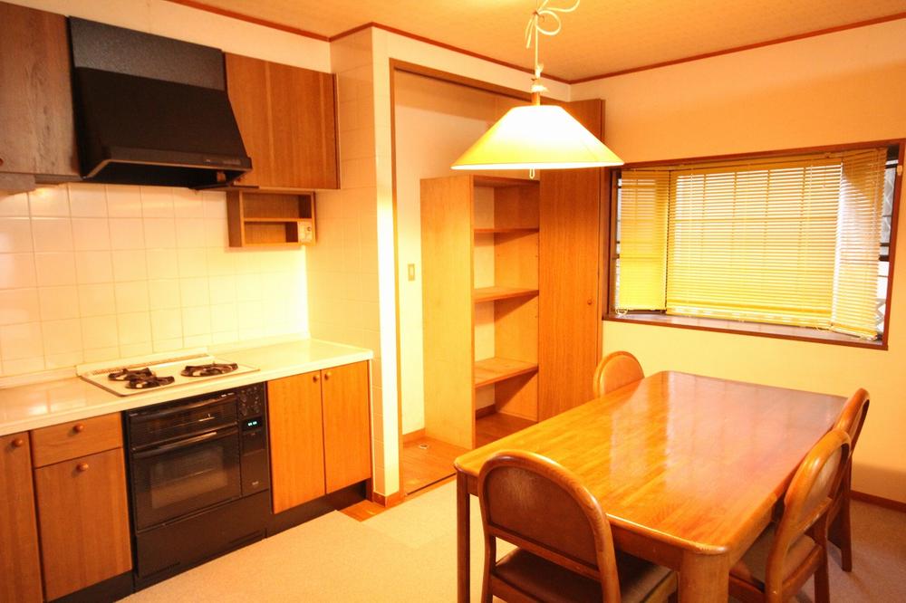 Kitchen. Also at the dining table,