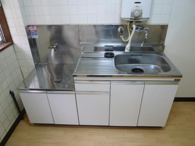 Kitchen. It comes with water heater