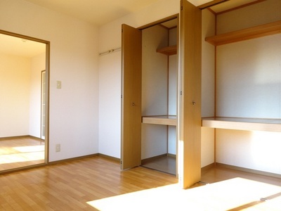 Living and room. There are two storage space also enter the bedding