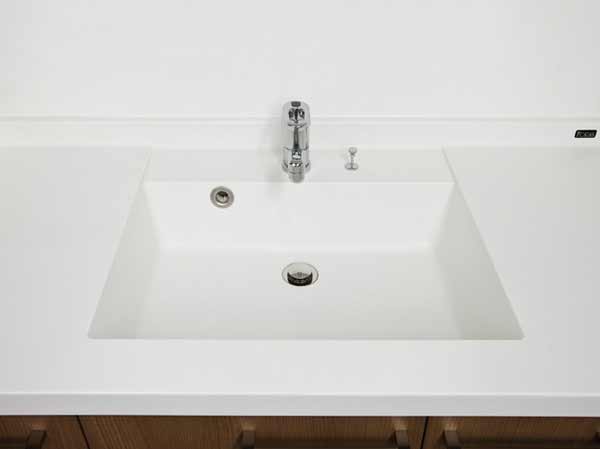 Bathing-wash room.  [Counter-integrated Square bowl] Simple form strike a fine cleanliness, Wash basin of artificial marble. There is no boundary between the counter and the bowl, It is stain-resistant making. (Same specifications)