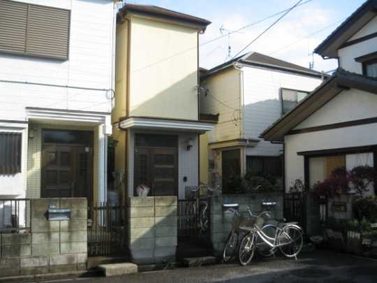 Local appearance photo. Two buildings is a sequence of terrace house!