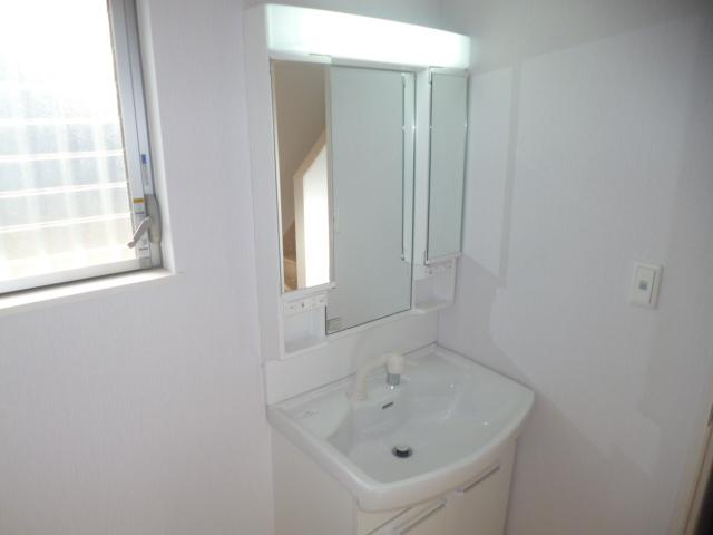 Wash basin, toilet. Bathroom vanity