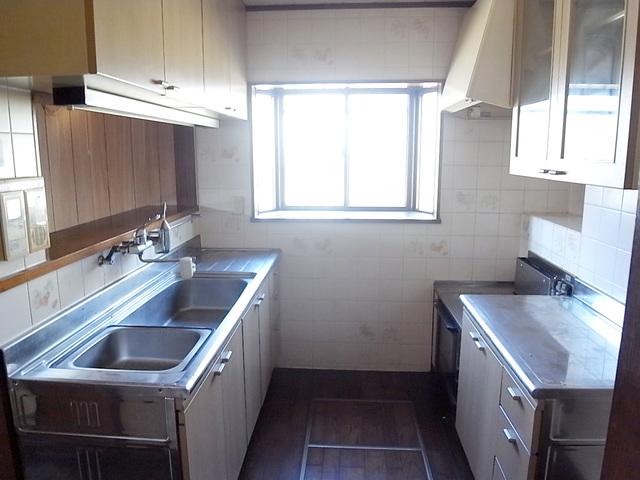 Kitchen. Face-to-face counter kitchen overlooking the living room