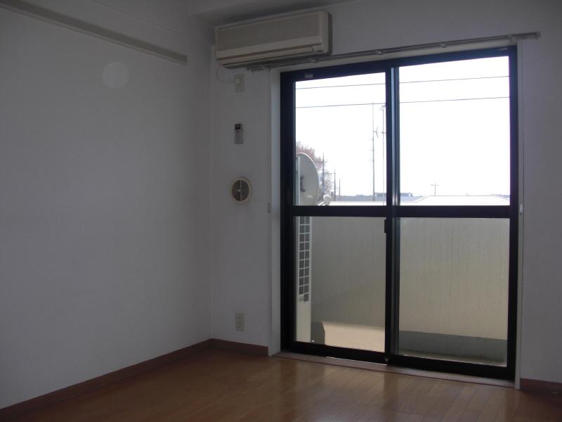 Living and room. There bright and air conditioning.