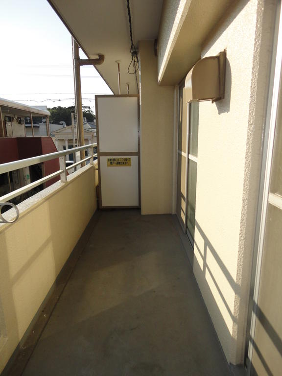 Balcony. Sunny. Washing thing is well dry likely