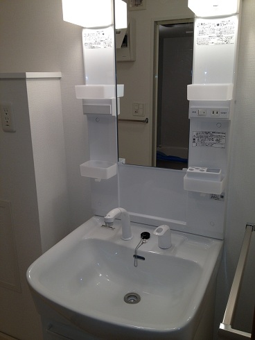 Washroom. It is a photograph at the time of new construction.