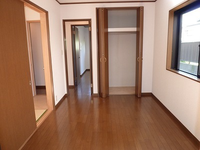 Living and room. There are two windows in the corner room, The room is bright.