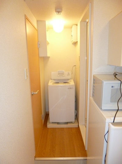 Other Equipment. Washing machine in the room