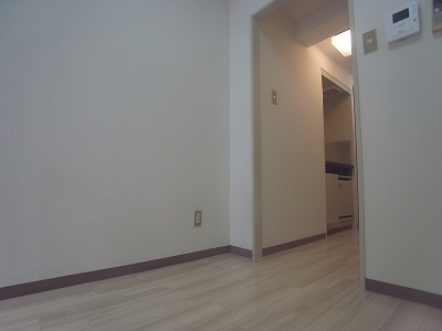 Living and room. Beautiful white flooring.
