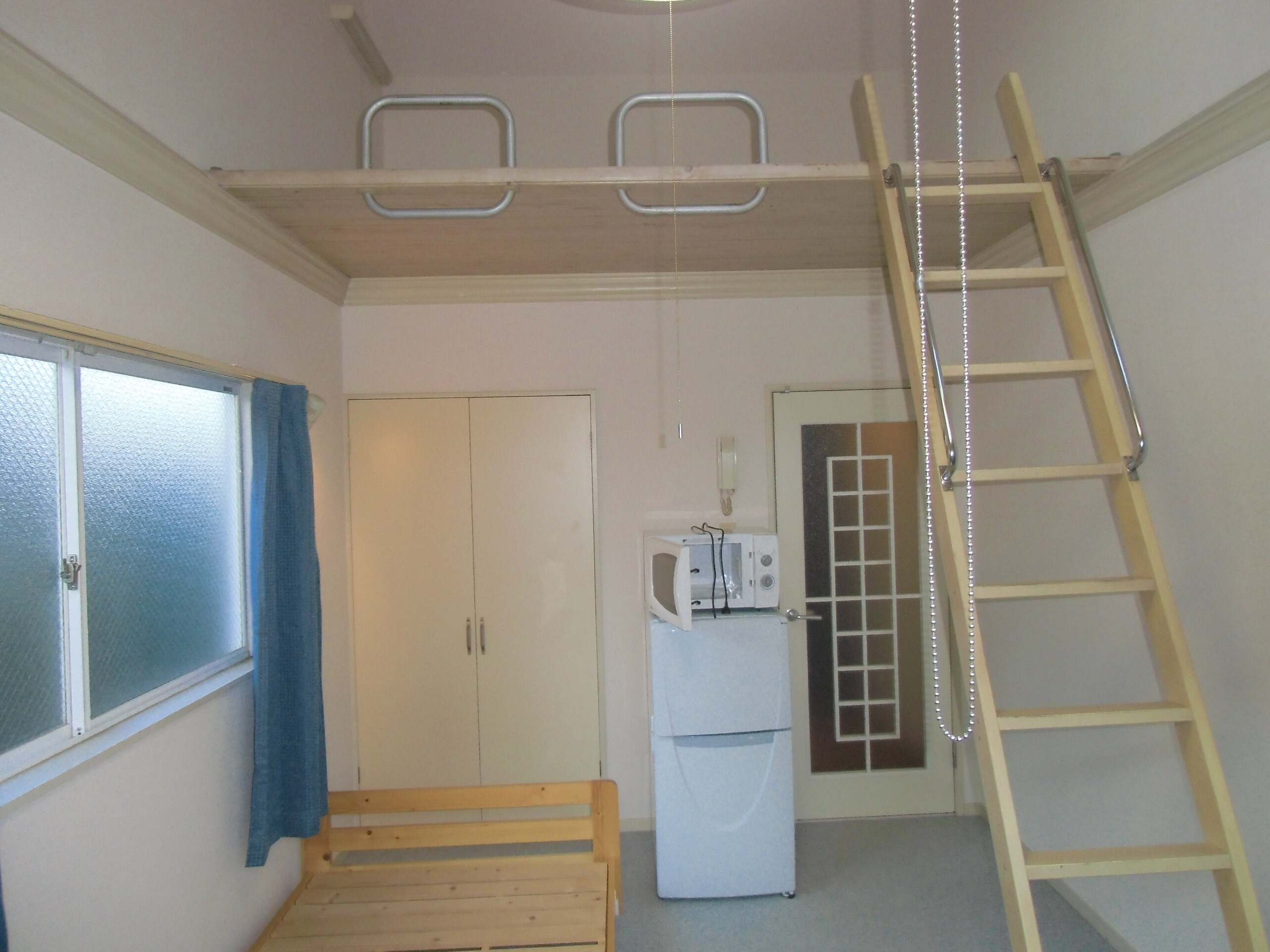 Living and room. loft, refrigerator, Microwave