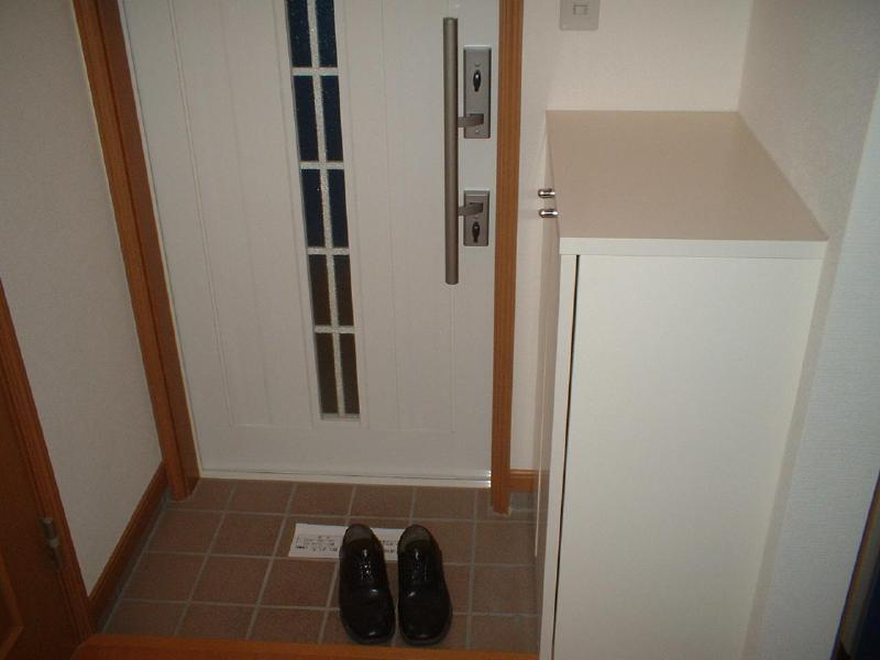 Entrance. With cupboard