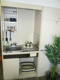 Kitchen. The photograph is a model room of the room.