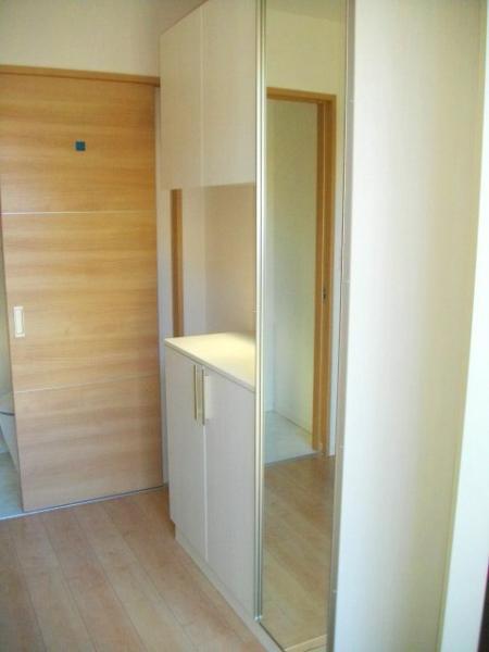 Entrance. Entrance in the housing wealth of shoes in cloak