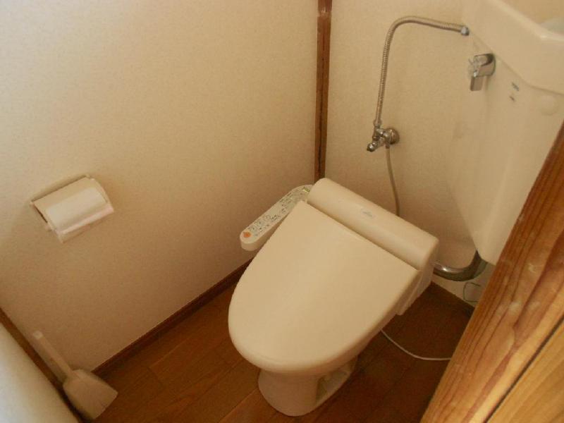 Toilet. Washlet is with