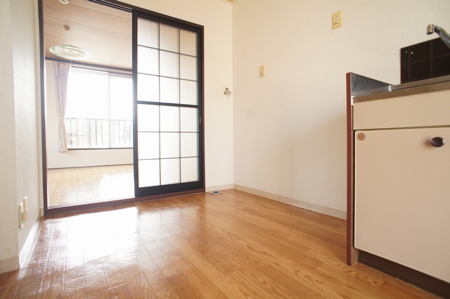 Kitchen. It is a photograph of another room.