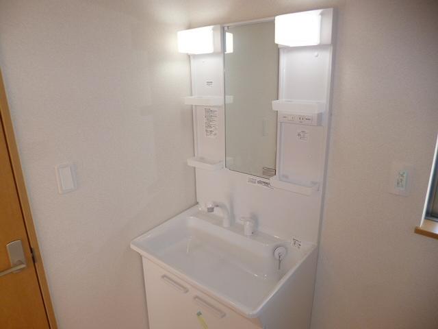 Wash basin, toilet. Bathroom vanity.